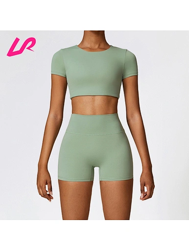 Get seamless comfort and style with our crop top and shorts set. Made with high-quality and stretchy fabric, our crop top and shorts set offers a comfortable and flattering fit.